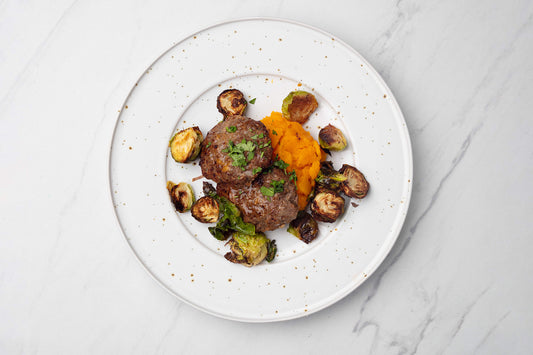 Caramelized Onion Burger with Roasted Brussels and Butternut Mash