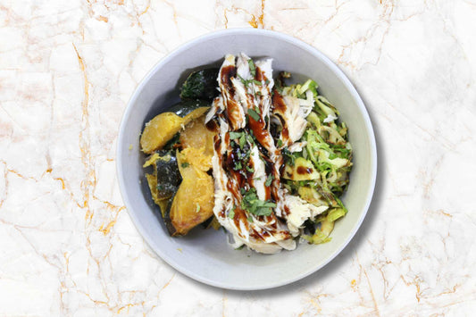 Balsamic Braised Chicken Thighs with Lemon Brussels Sprout Hash and Roasted Acorn Squash - Pete's Real Food